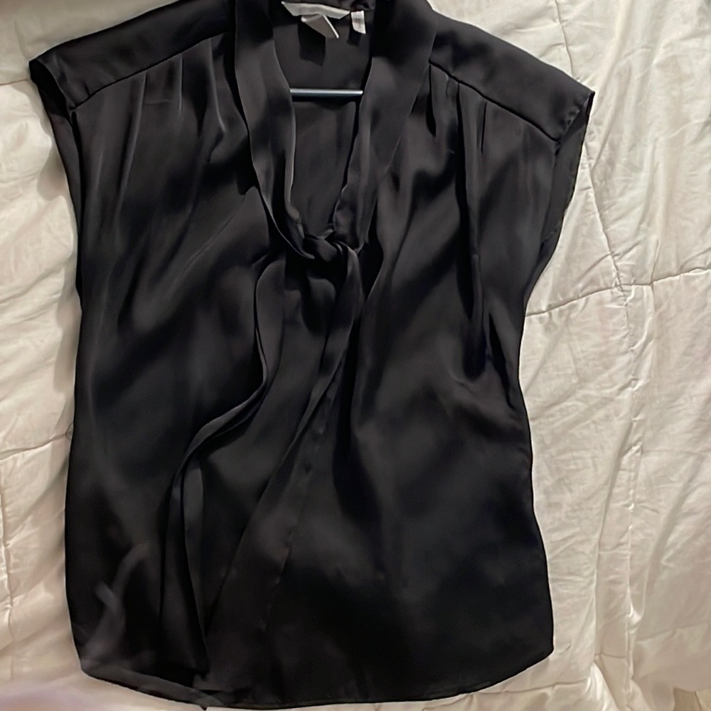 Black top, great for warm summer nights or under a blazer! Fit US2- US4.